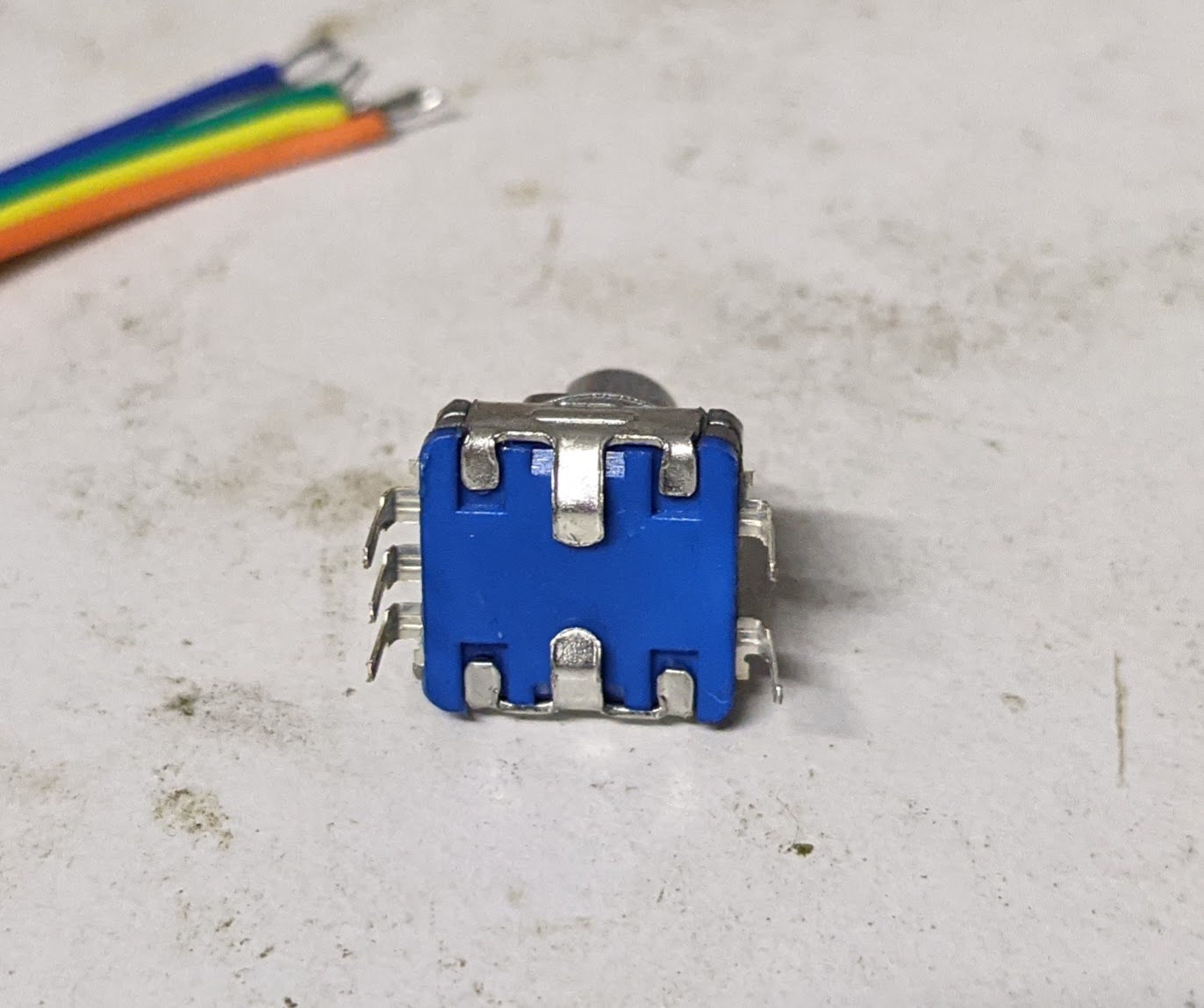 Bending the mounting tabs on the rotary encoder